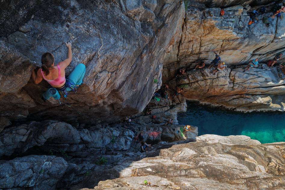 Climber placing hex in granite crack